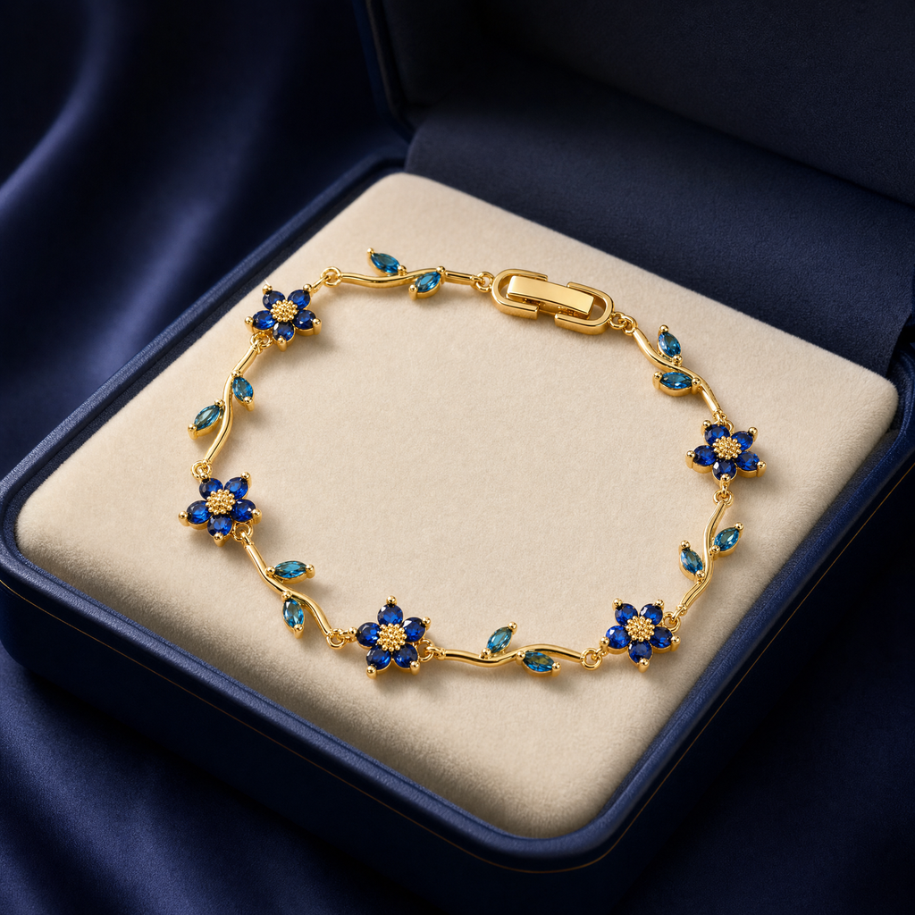 Blue Crystal Floral Vine Bracelet, Gold Plated Brass Marquise Leaf Detail
